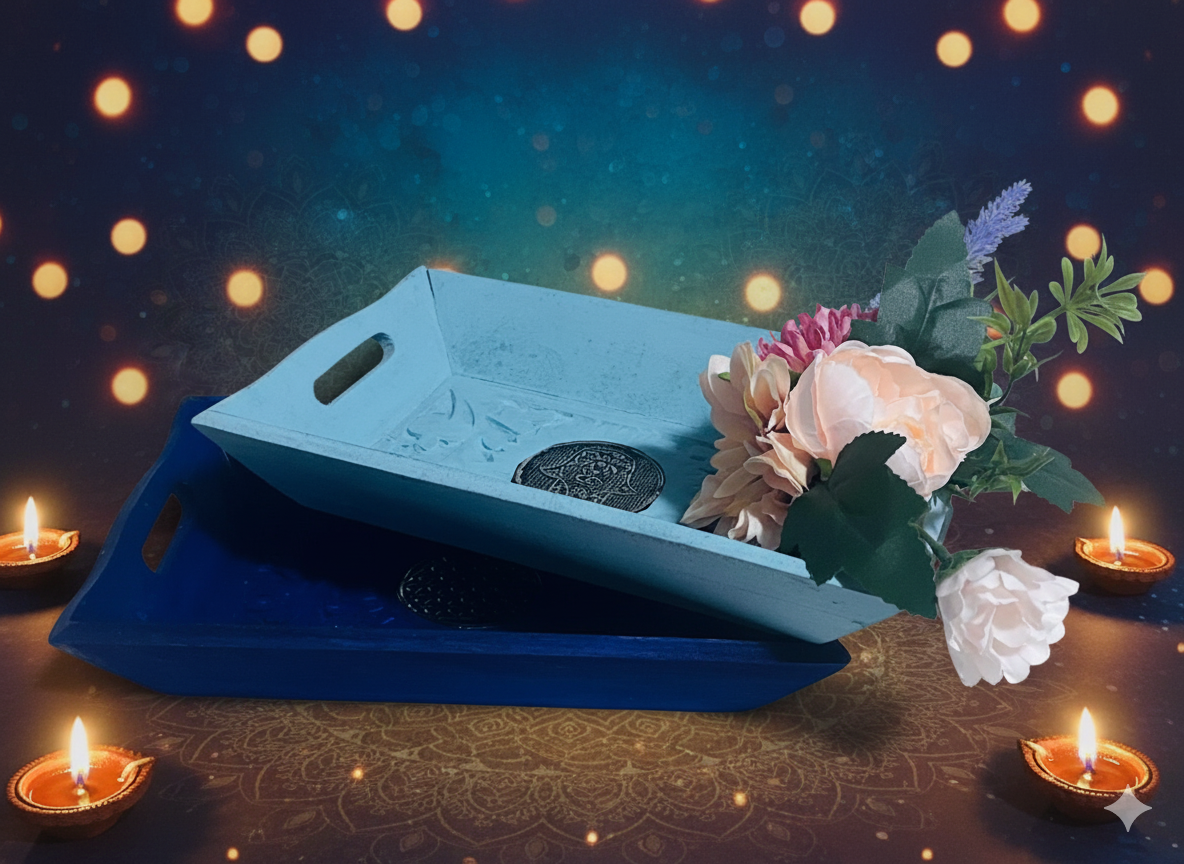 Blue trays with flowers and candles on a decorative surface with a dark background