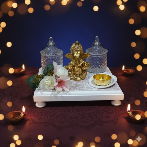 Blossom Hampers Auspicious Elegance Gift Set with Golden Ganesh Idol, two crystal jars, and white floral Chawki platform.