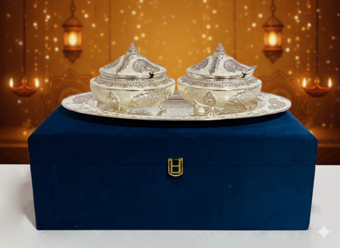 Close-up of the ornate embossed silver lids on the Regal Twin Bowls.